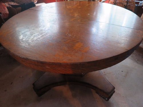 Antique oak round dining table with 2 leaves